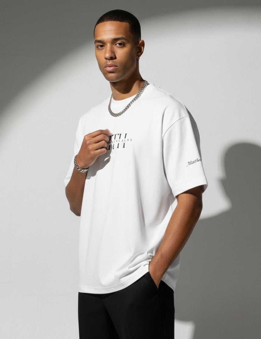 Faith Moves Mountains | White Boxy Graphic Tee – Matthew 17:20