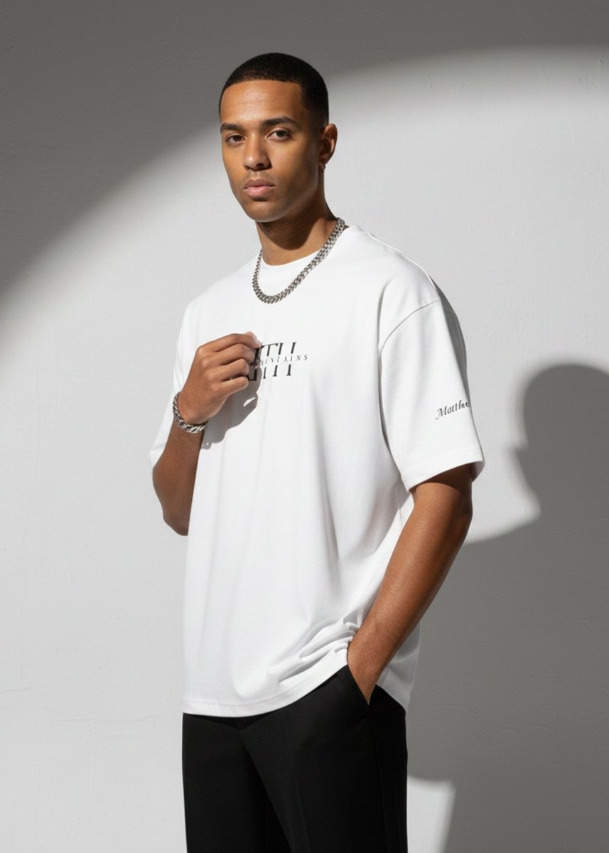 Faith Moves Mountains | White Boxy Graphic Tee – Matthew 17:20